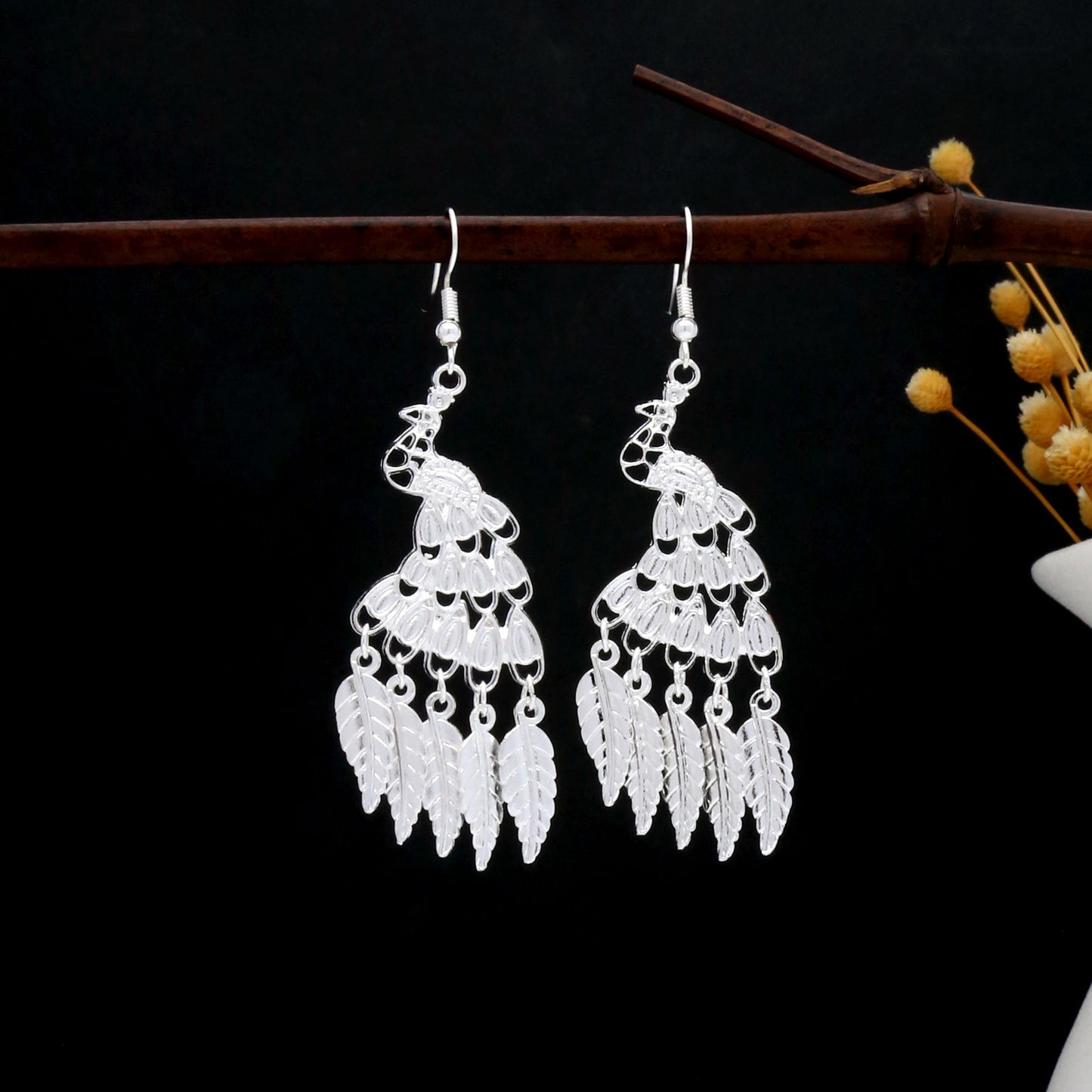 Dawn Cloud Chime-E1664-3 Miao-inspired earrings with Chinese-inspired cultural detail