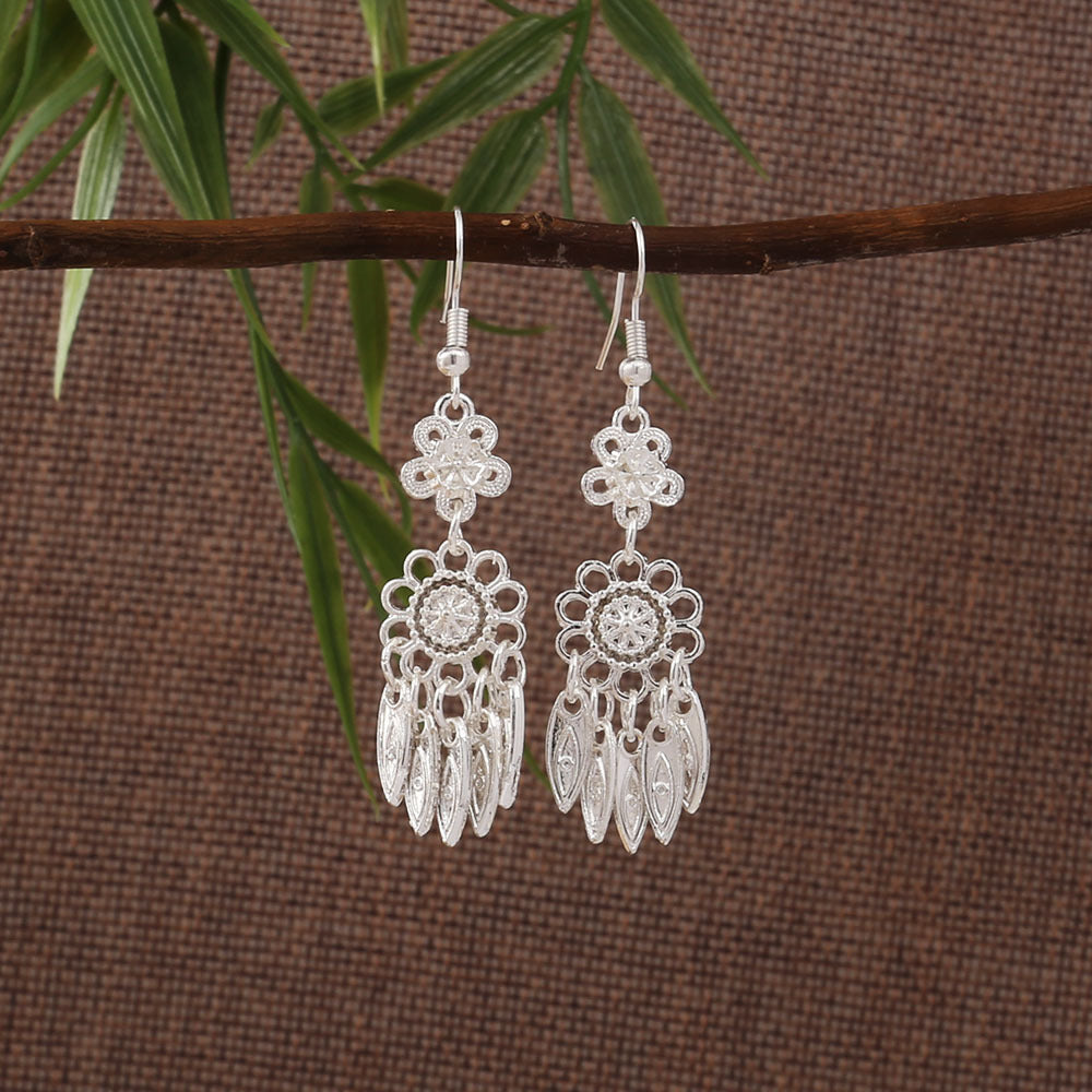 Dawn Silver Bell-E8770 Miao-inspired earrings with Chinese-inspired cultural detail