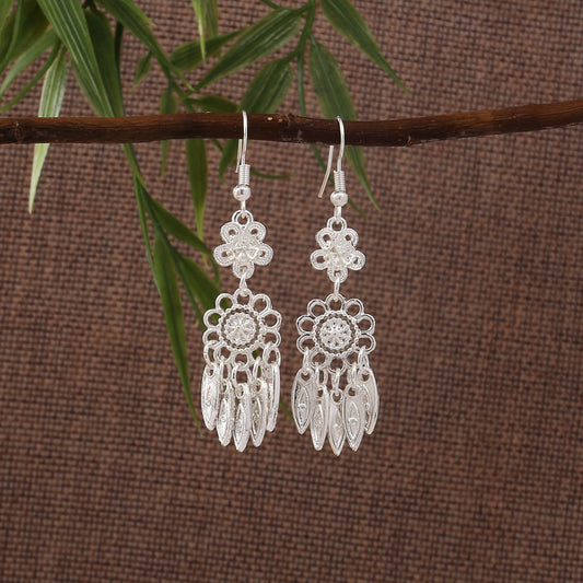 Dawn Silver Bell-E8770 Miao-inspired earrings with Chinese-inspired cultural detail