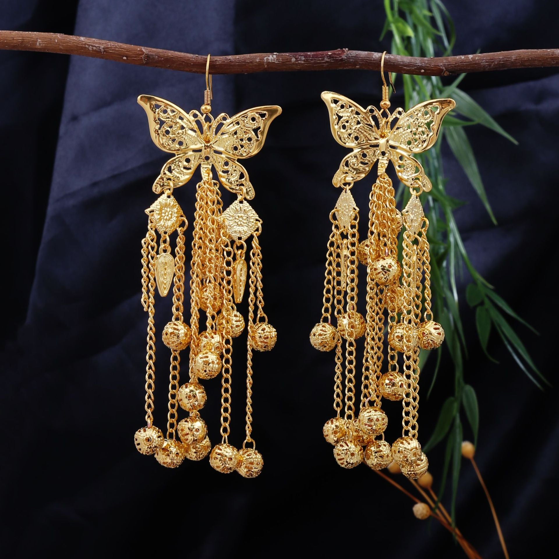 Golden Silver Bell-E4570-2 Miao-inspired earrings with Chinese-inspired cultural detail